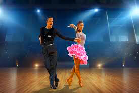 Professional Cha Cha Cha dancers performing elegant Cuban dance at luxury event